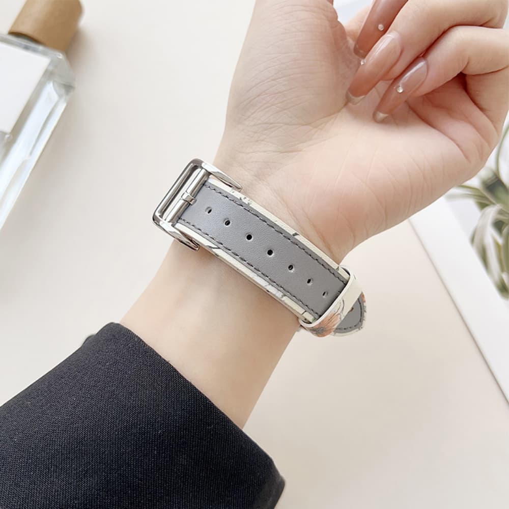 Hollow-out butterfly pattern contrast-colored leather watchband