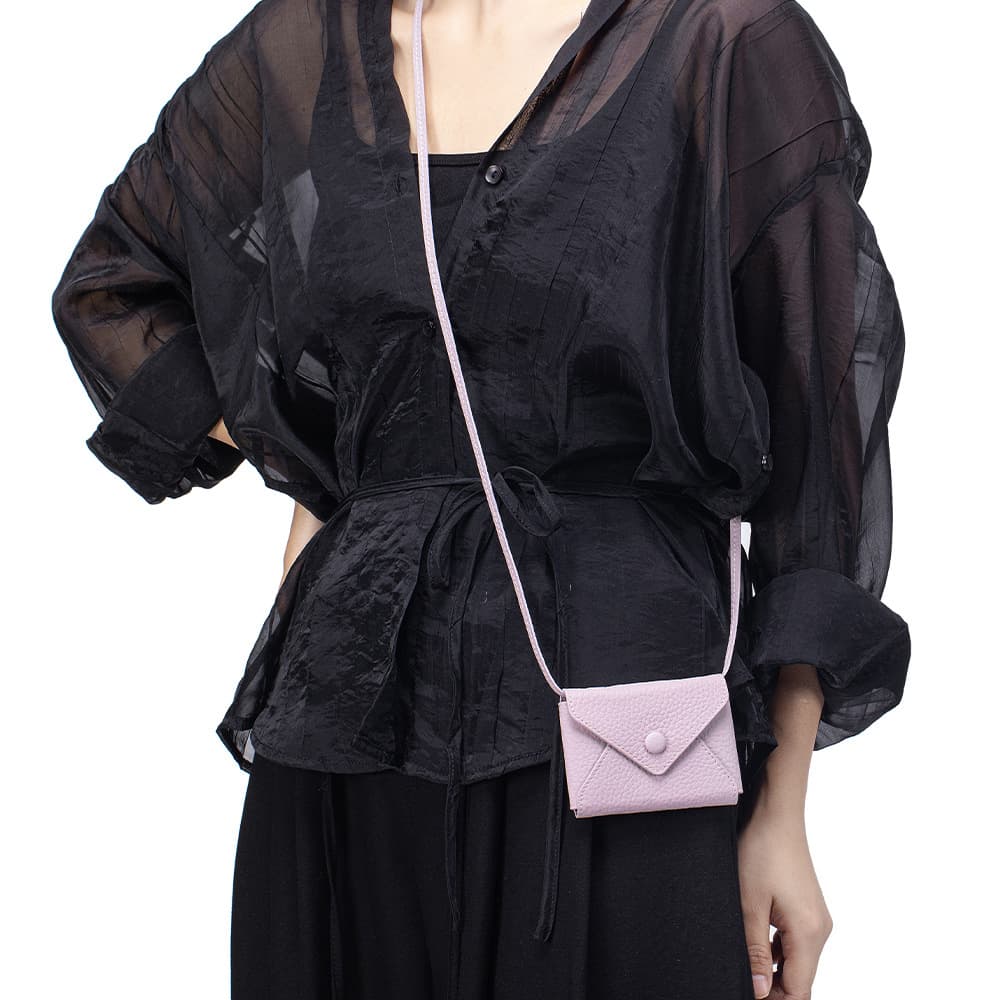 Crossbody envelope shaped solid color leather card bag
