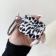 Cow patterned soft silicone buckle earphone case