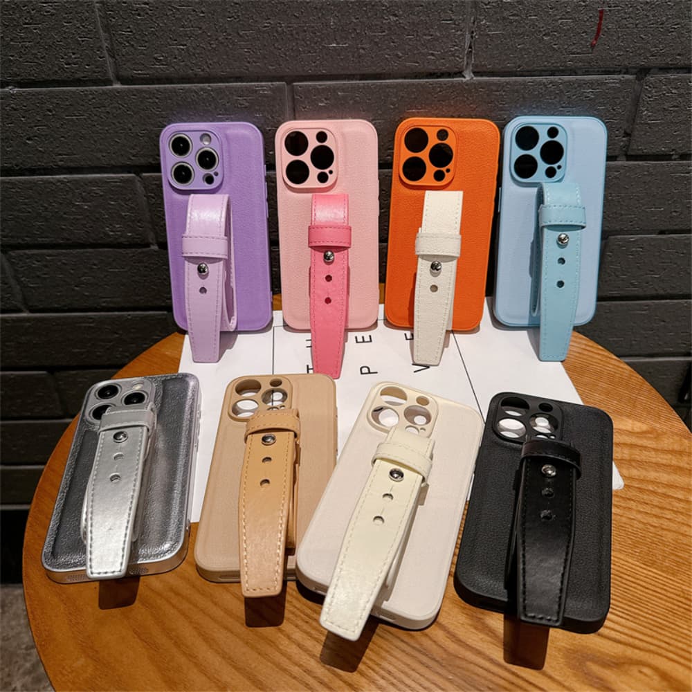 Center adjustable wristband style solid color leather phone case