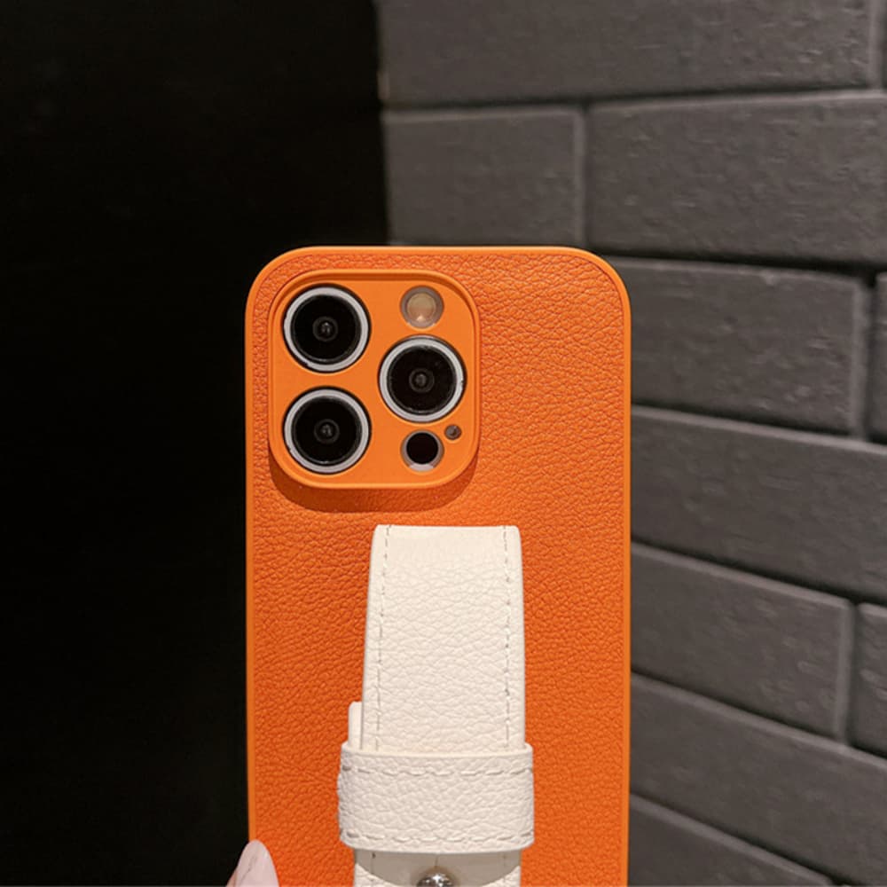 Center adjustable wristband style solid color leather phone case