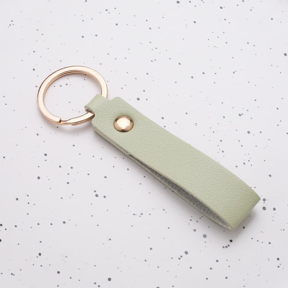 Rivet decoration solid color PU leather long strip keychain
