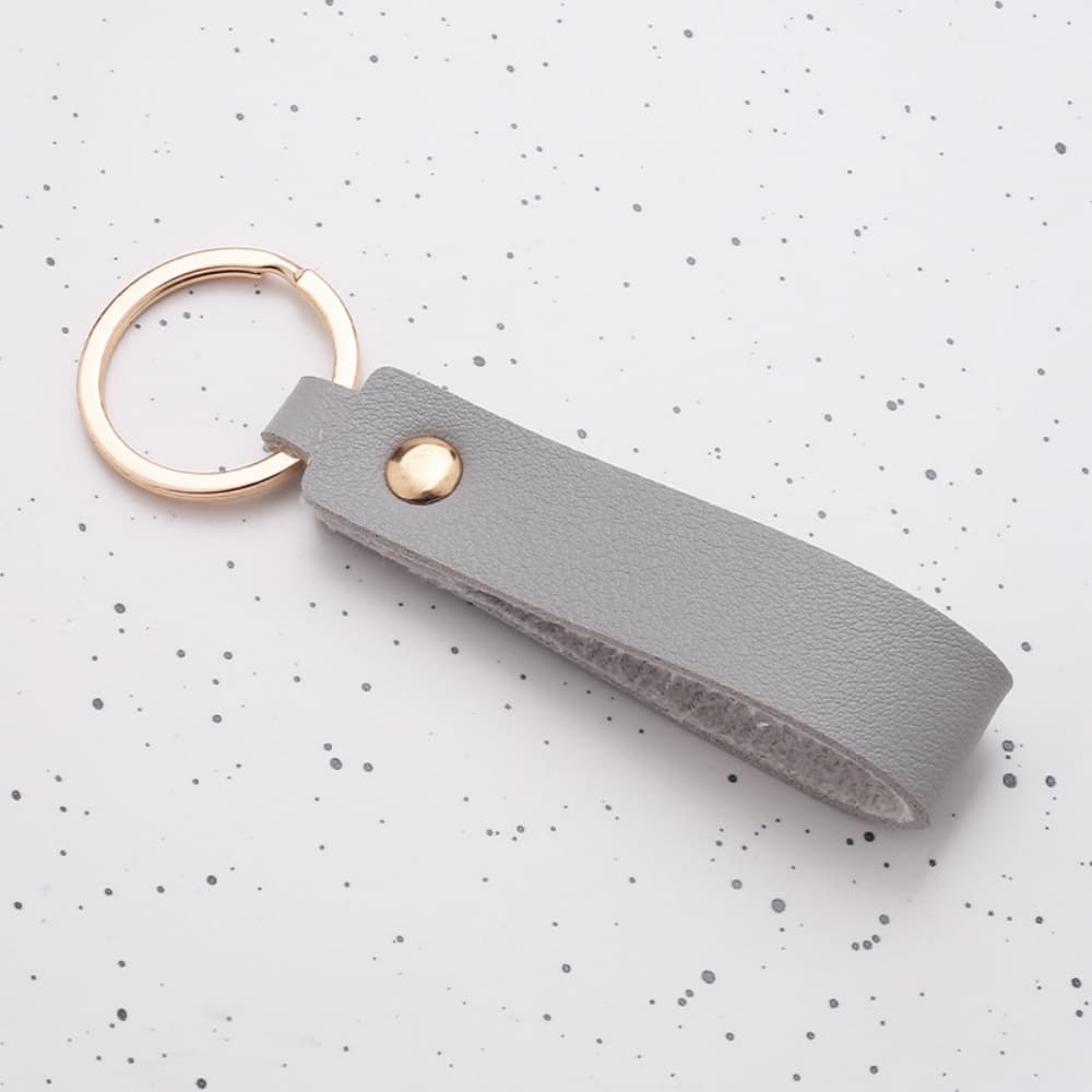 Rivet decoration solid color PU leather long strip keychain