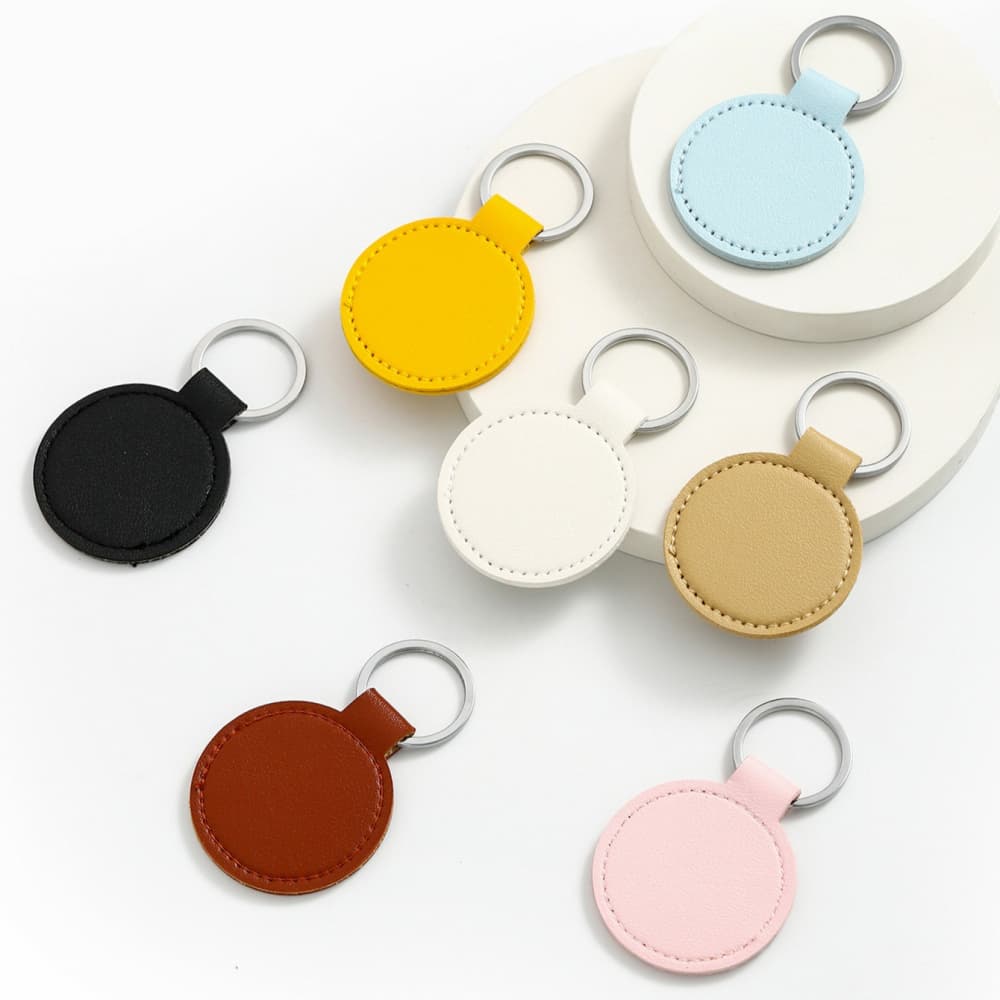 Solid color PU leather round silver buckle keychain