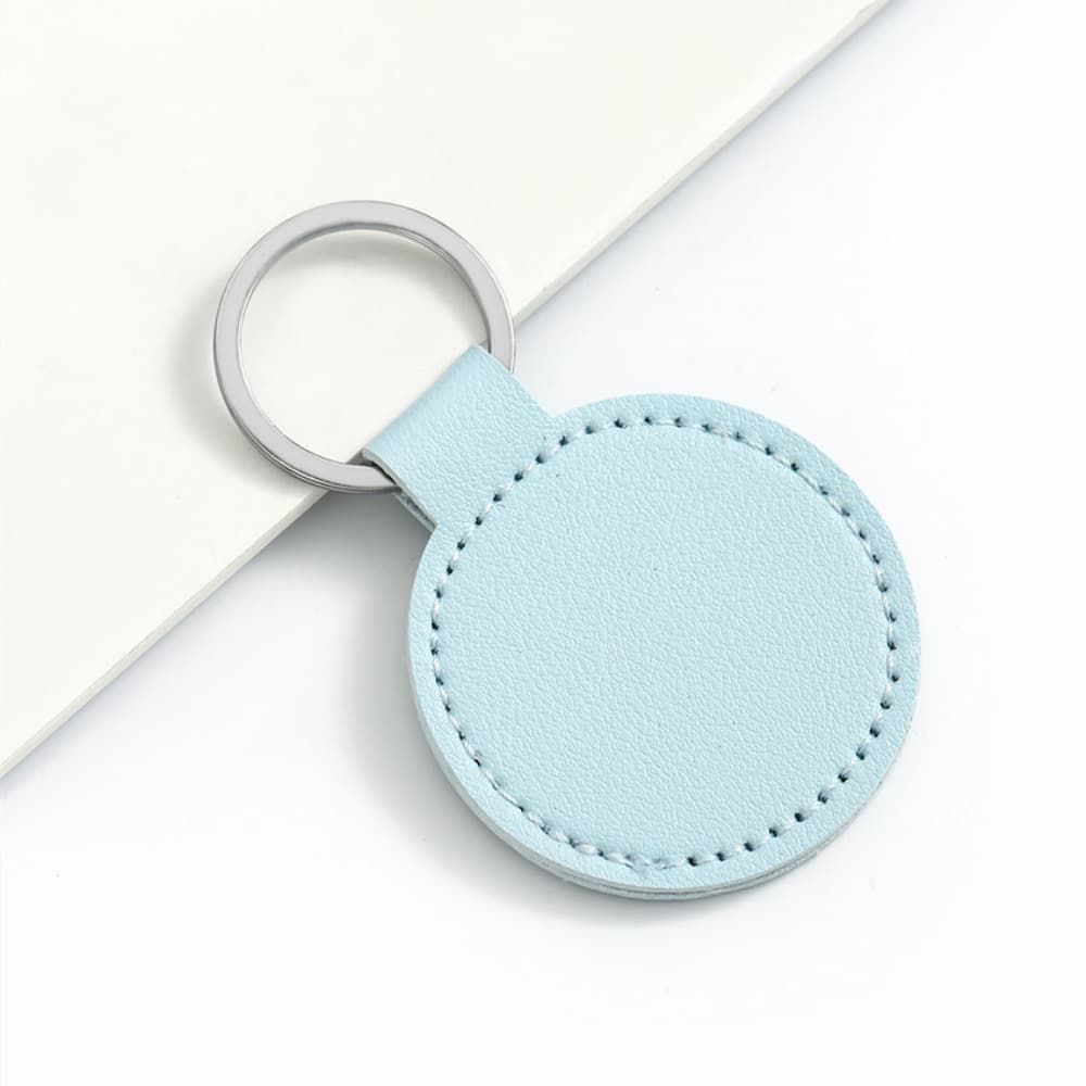Solid color PU leather round silver buckle keychain