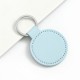 Solid color PU leather round silver buckle keychain
