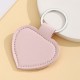 Solid color PU leather heart-shaped silver buckle keychain