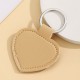 Solid color PU leather heart-shaped silver buckle keychain