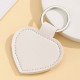 Solid color PU leather heart-shaped silver buckle keychain
