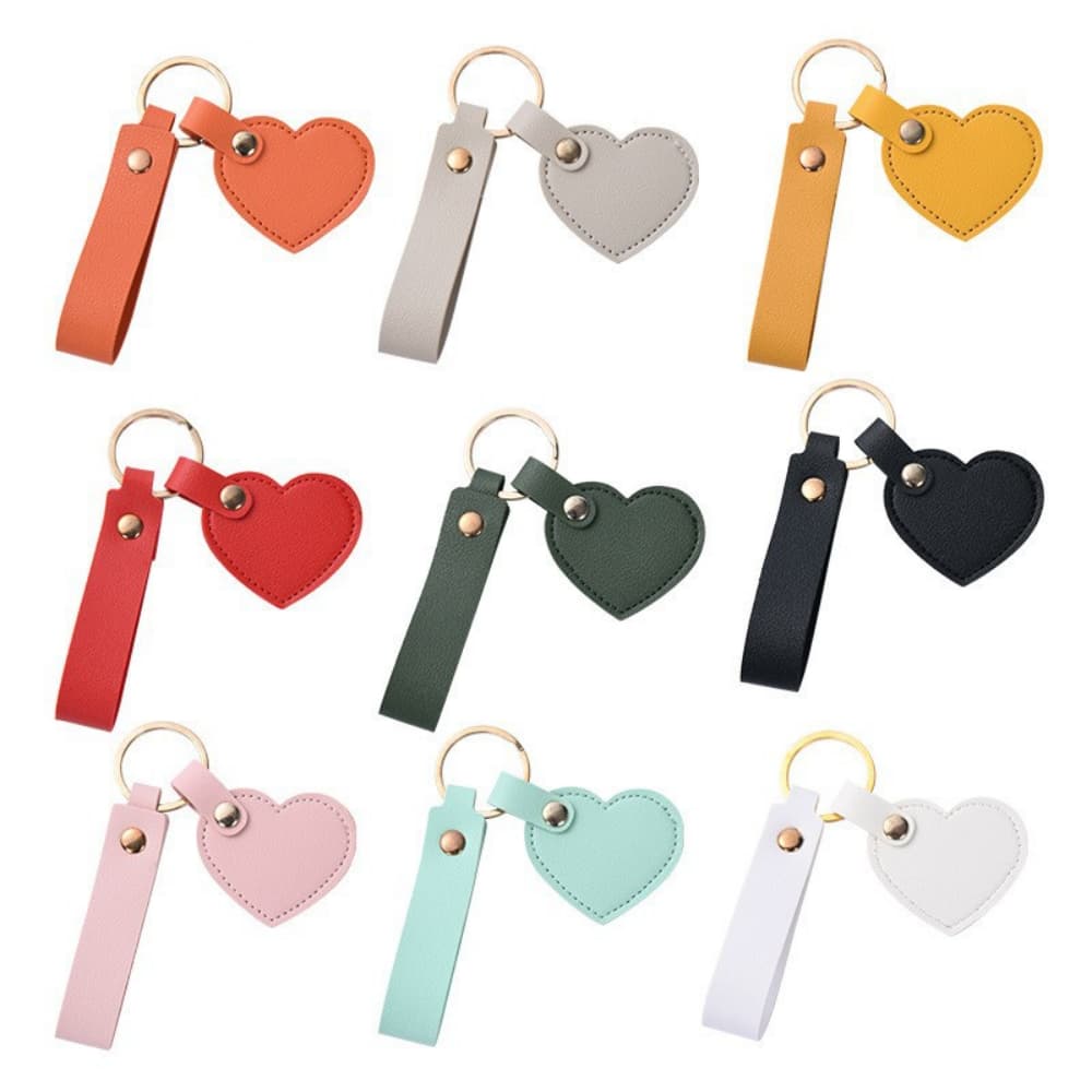 Heart shaped pendant with long solid color artificial leather keychain