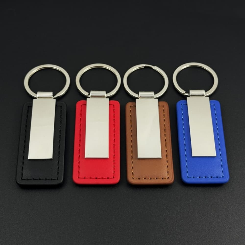 Square metal connector with solid color artificial leather keychain